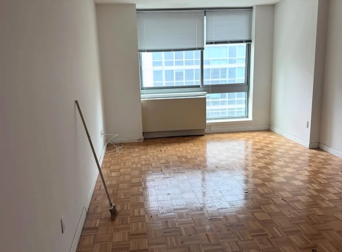 Apartment after: room emptied and swept, ready for move-in